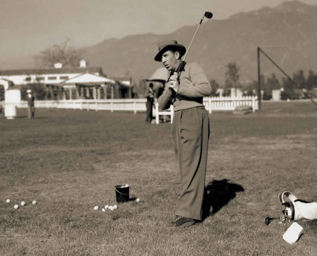 Historic photograph of a golfer at the practice range